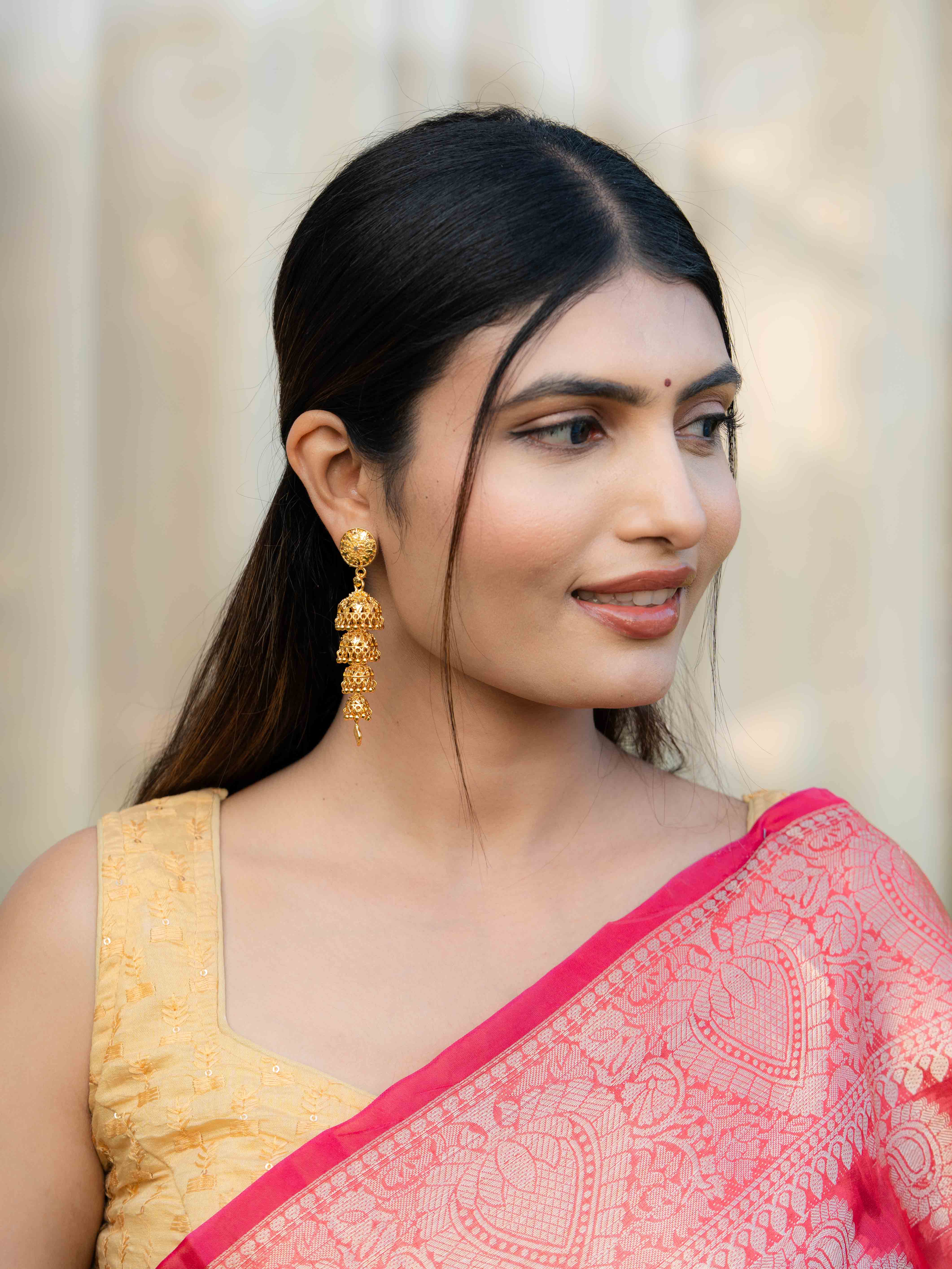 Hemanika Long Gold Earrings - Image 3
